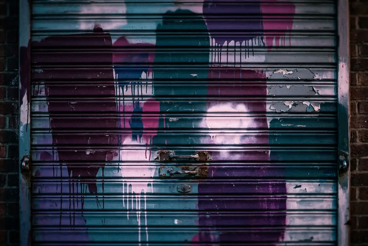 layers of color built up on a shutter door over years of use